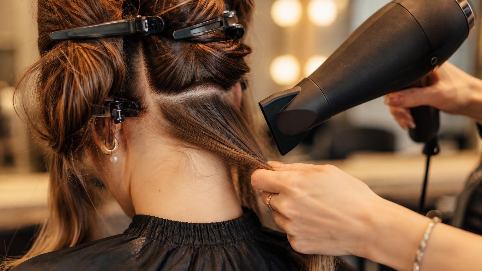 Safe heat settings for a blow dry, by hair type — shown step by step in this guide
